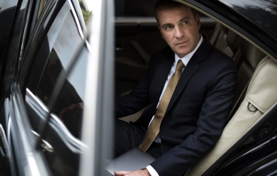 A person sitting in a limo